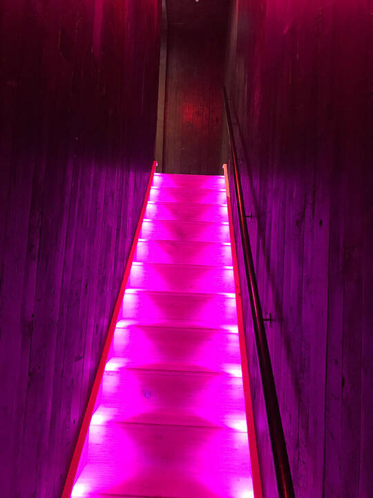 Colour change stairwell lighting, local restaurant